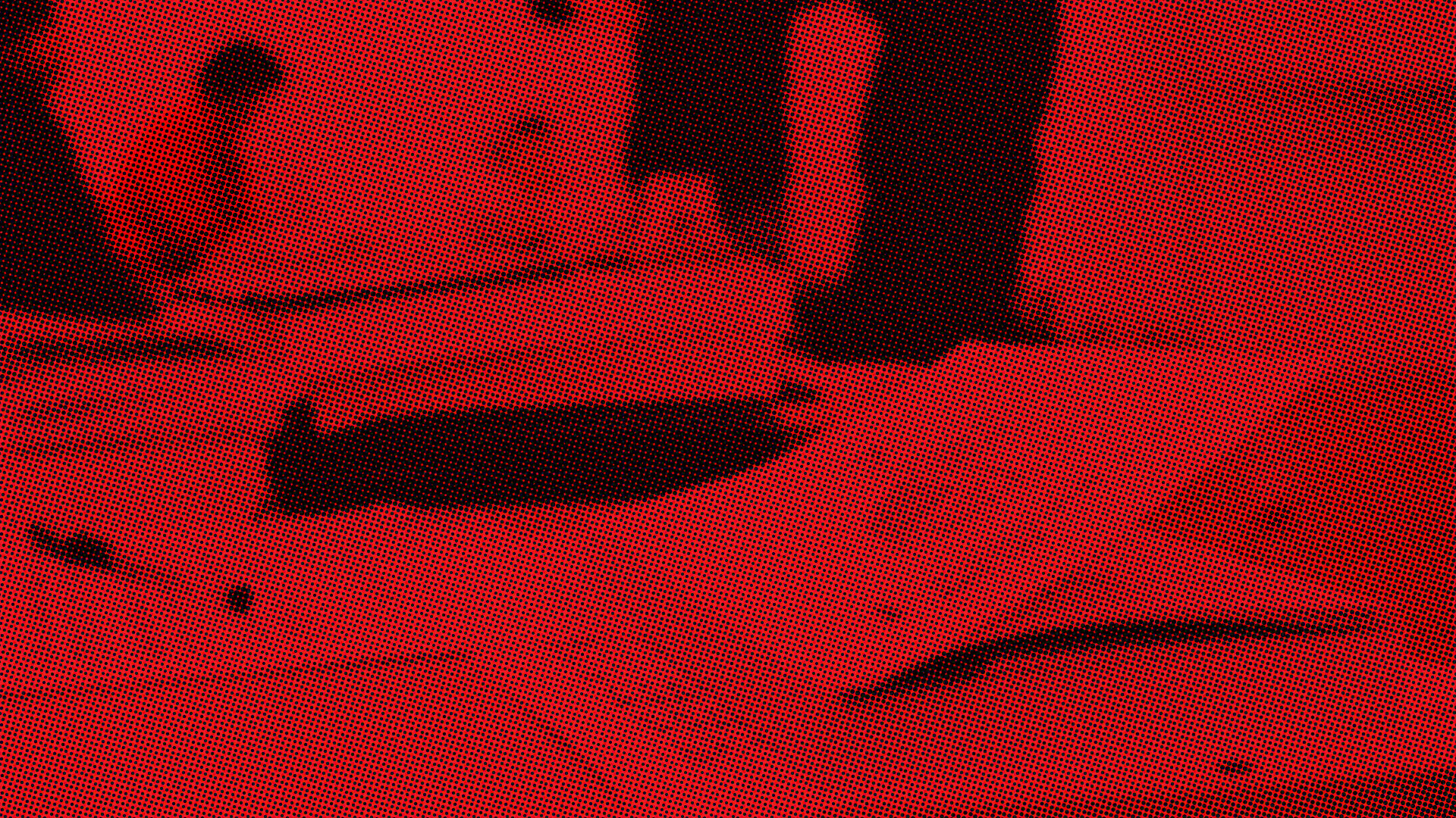 Documents and handwritten notes spread across a table.