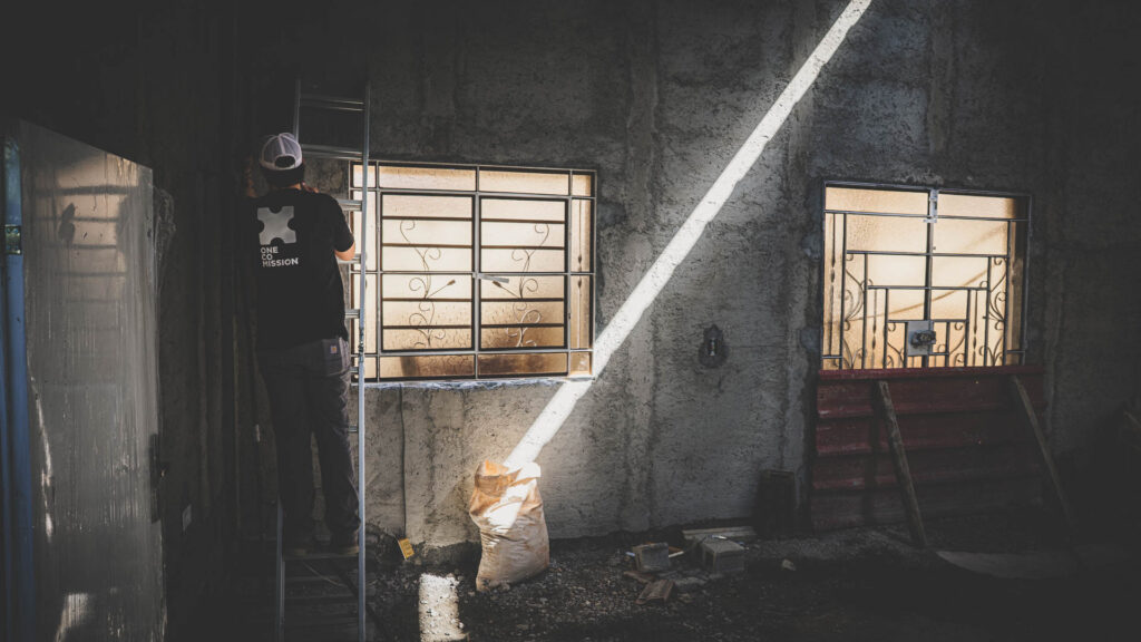 OneCoMission team member working inside a local church under construction in Cuba.