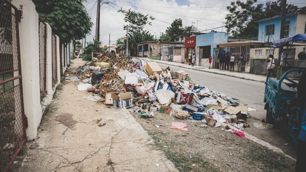 Garbage piled along a residential street in Havana, Cuba.