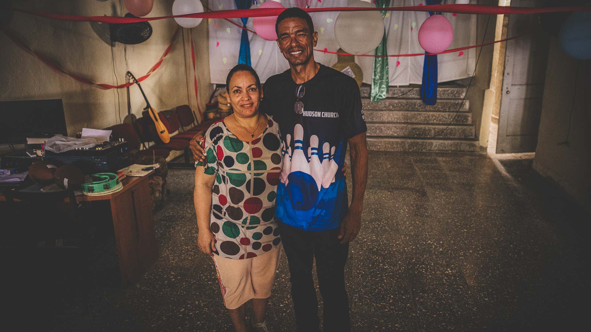 Local pastors standing together inside their church in Havana, Cuba.