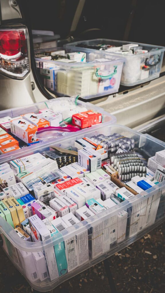 Medicine and medical supplies prepared for a Mobile Medical Clinic serving refugees in Iraq.