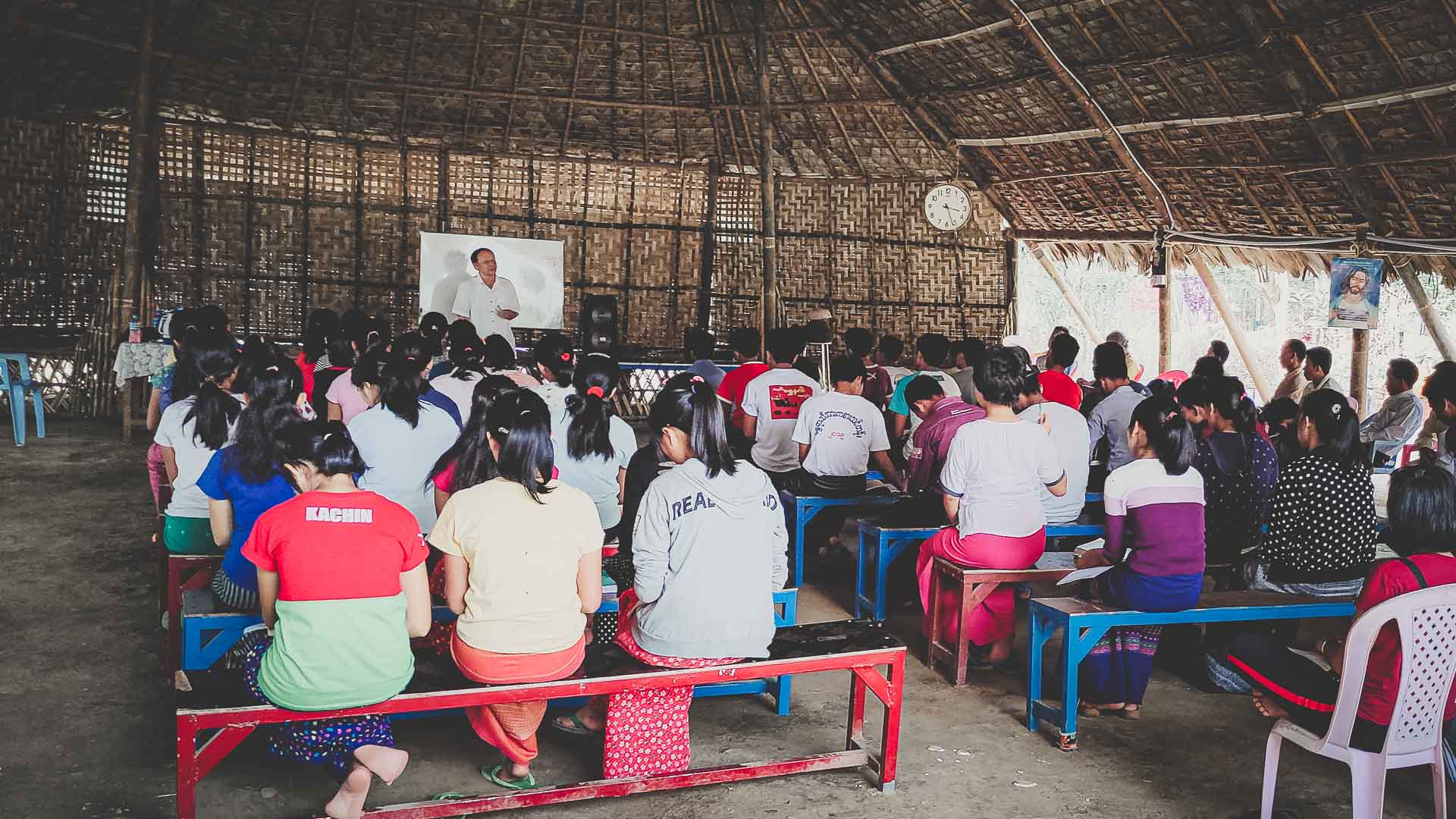 Believers gathered for ABC Christian discipleship and Bible teaching in Myanmar.