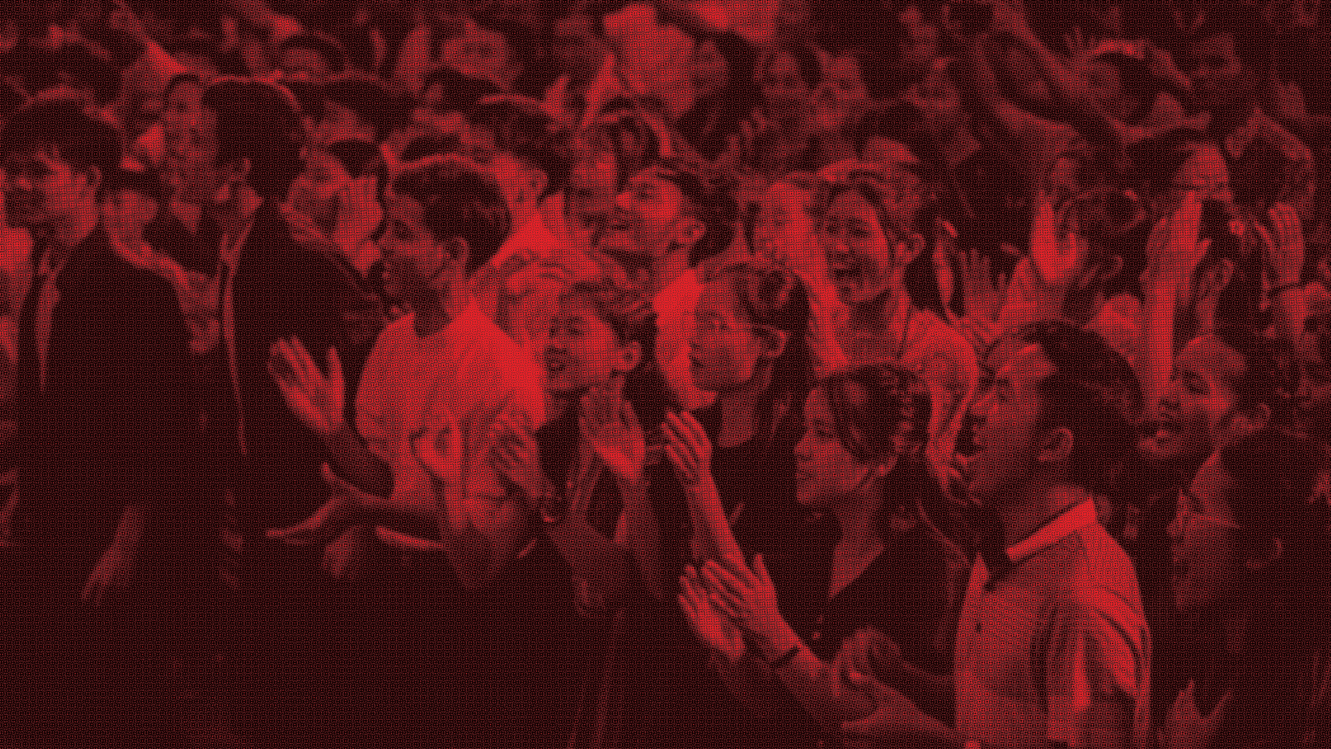 Large crowd with raised hands at a gathering in Myanmar.