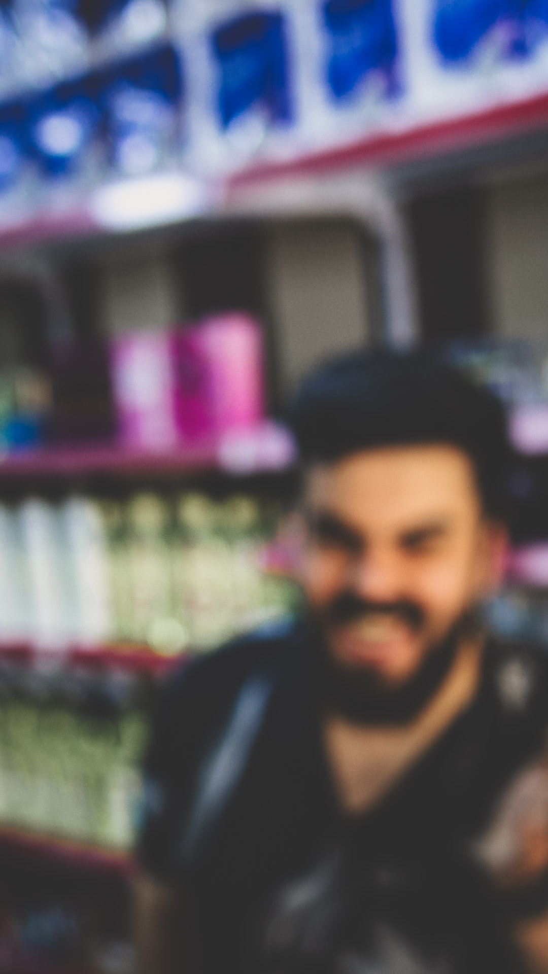 Small business owner in Iraq intentionally blurred to protect his identity.