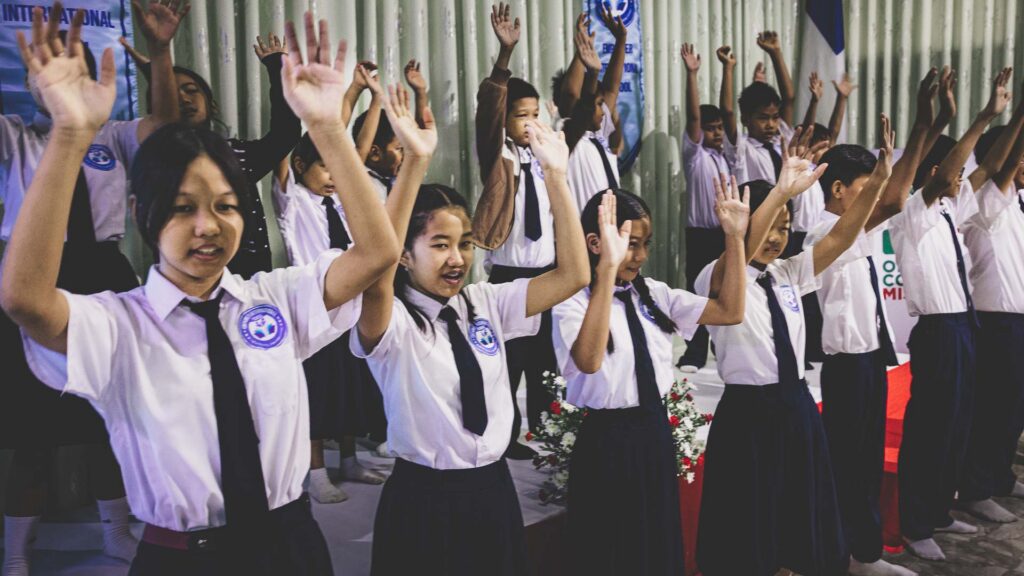 Students worship together at Empower International School in Myanmar.